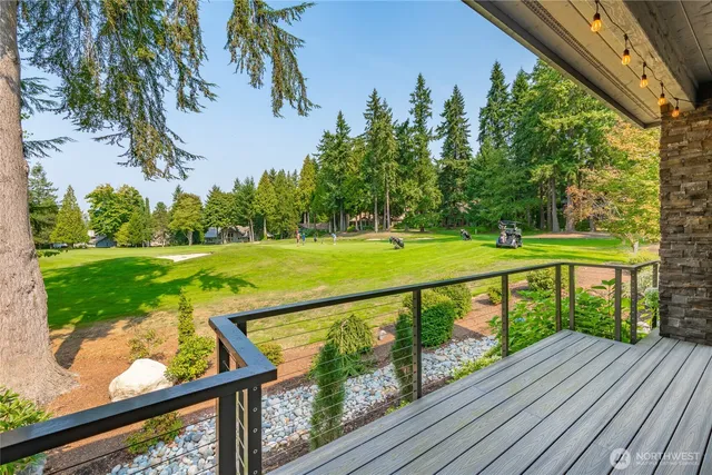 a view of swimming pool from a balcony