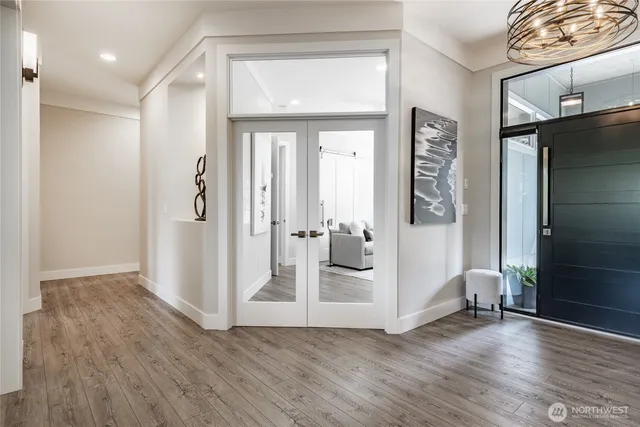 a view of entryway with wooden floor