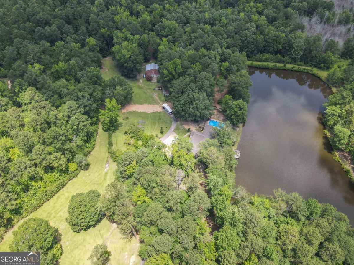 4973 Greenville Road LaGrange, GA 30241 - Photo 25 of 108 an aerial view of residential house with outdoor space and trees all around