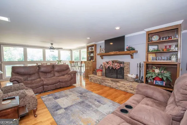 a bedroom with a bed and a couch