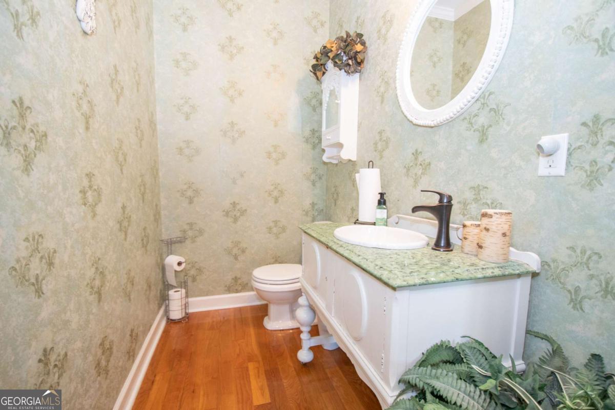 4973 Greenville Road LaGrange, GA 30241 - Photo 61 of 108 a bathroom with a sink and a mirror