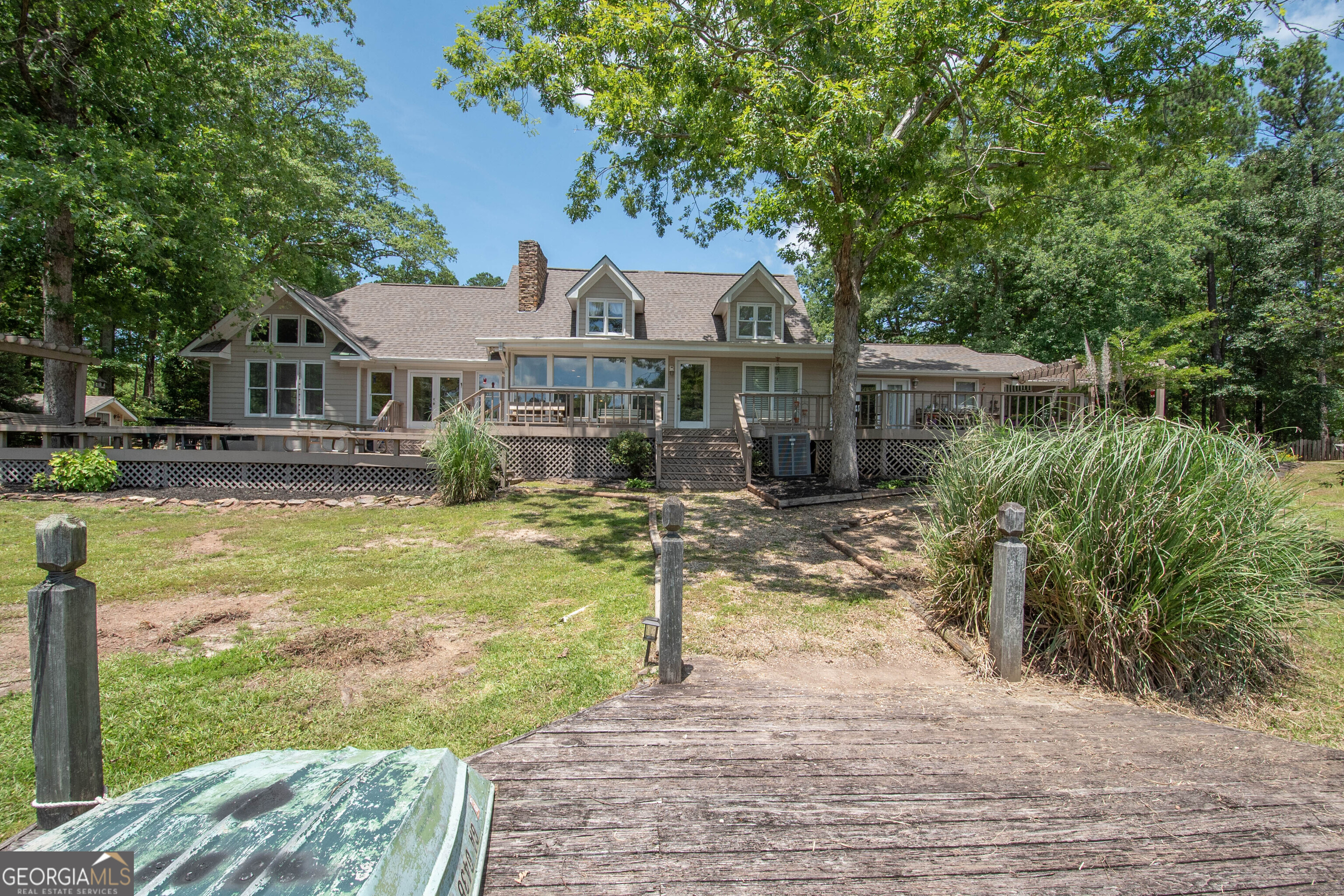 4973 Greenville Road LaGrange, GA 30241 - Photo 86 of 108 a front view of a house with a yard table and chairs