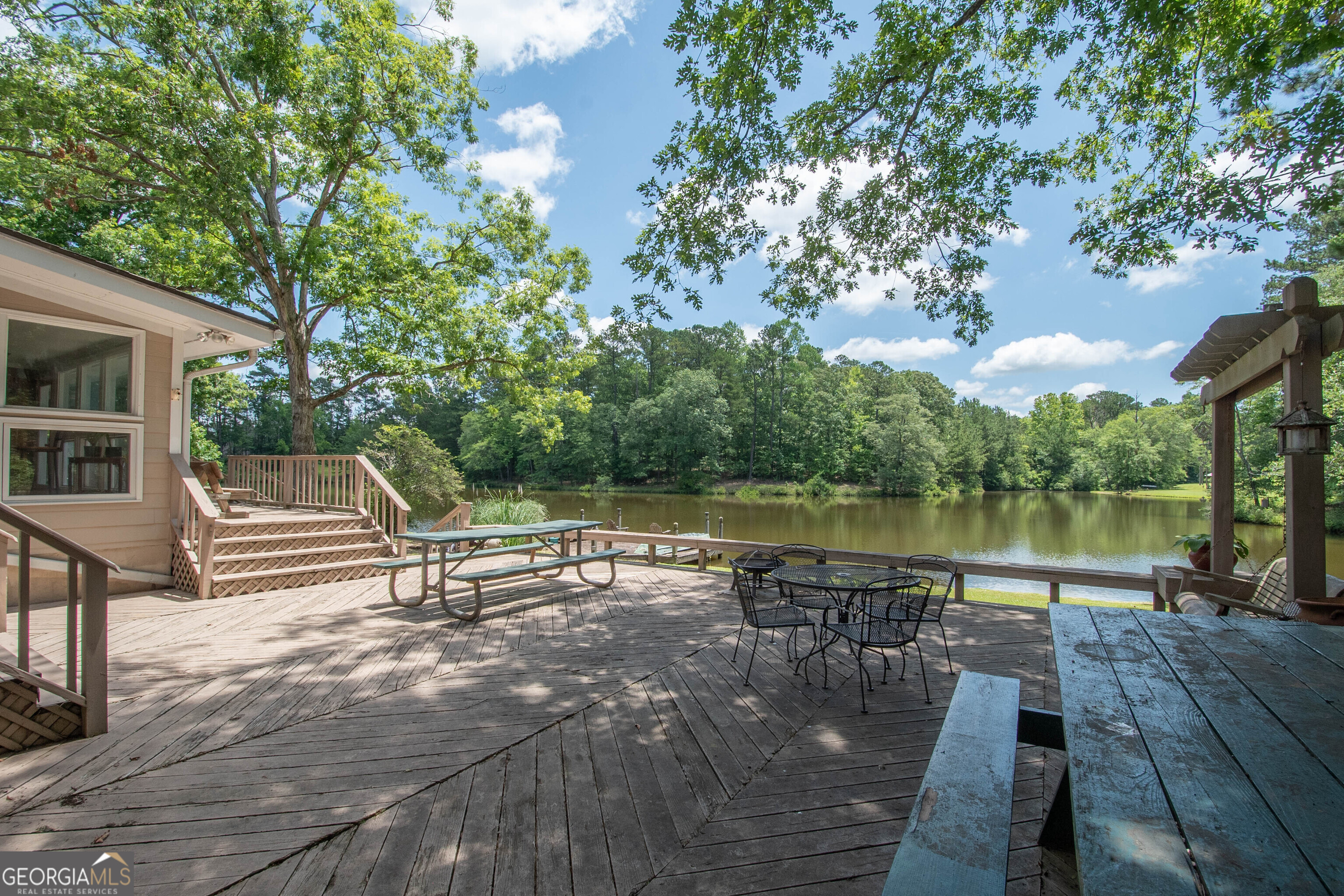 4973 Greenville Road LaGrange, GA 30241 - Photo 91 of 108 a view of a lake with chairs