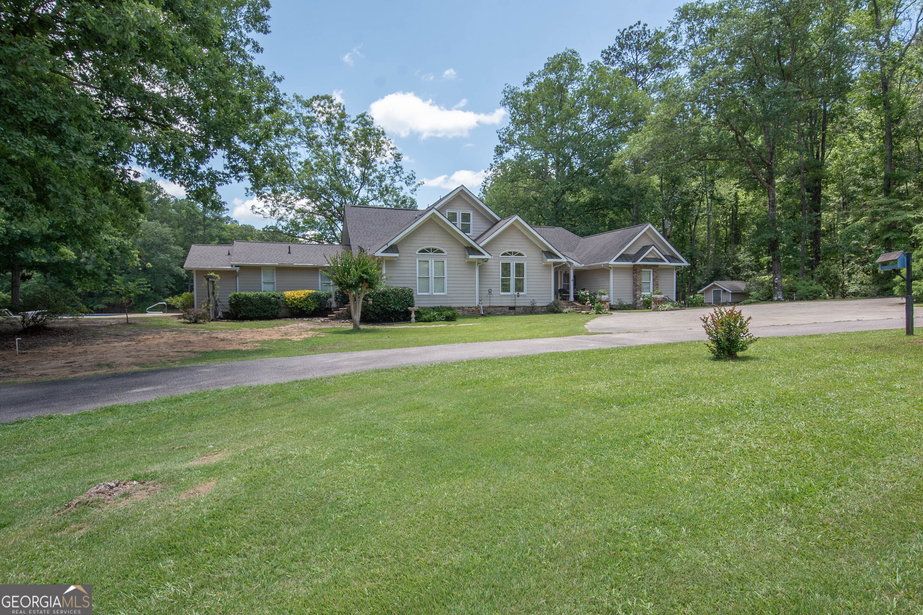 4973 Greenville Road LaGrange, GA 30241 - Photo 93 of 108 a front view of a house with a yard and trees