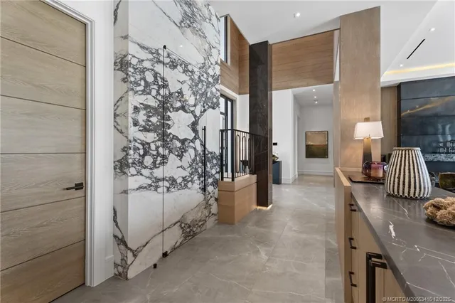 a bathroom with a sink and a washer dryer