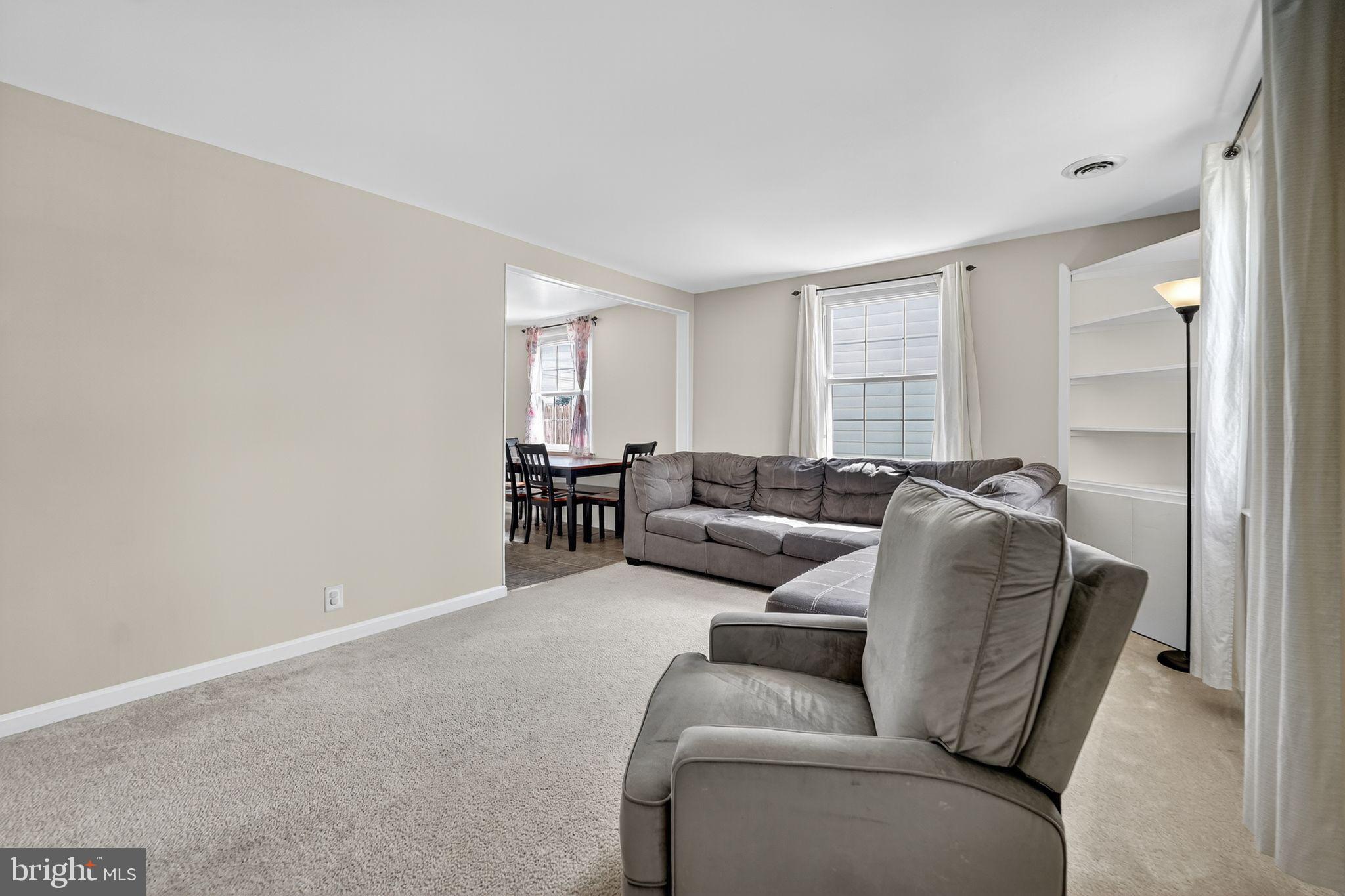 3127 Cornwall Road Baltimore, MD 21222 - Photo 4 of 24 a living room with furniture and a window