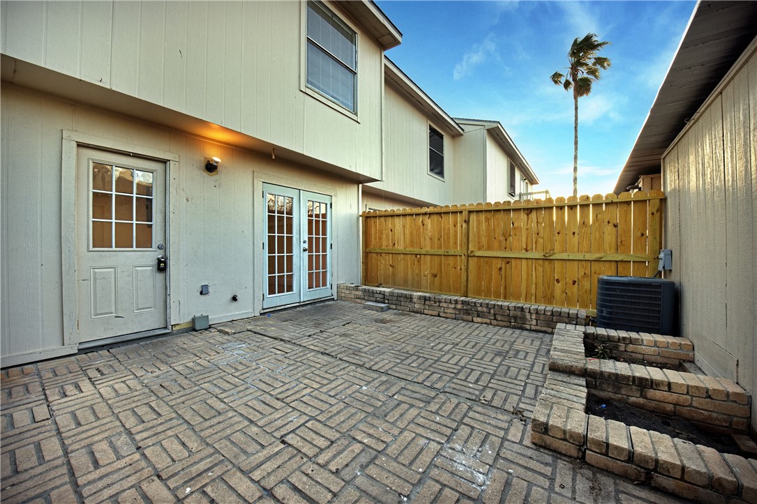 6702 Everhart Road, Unit H104 Corpus Christi, TX 78413 - Photo 17 of 20 Fenced back patio