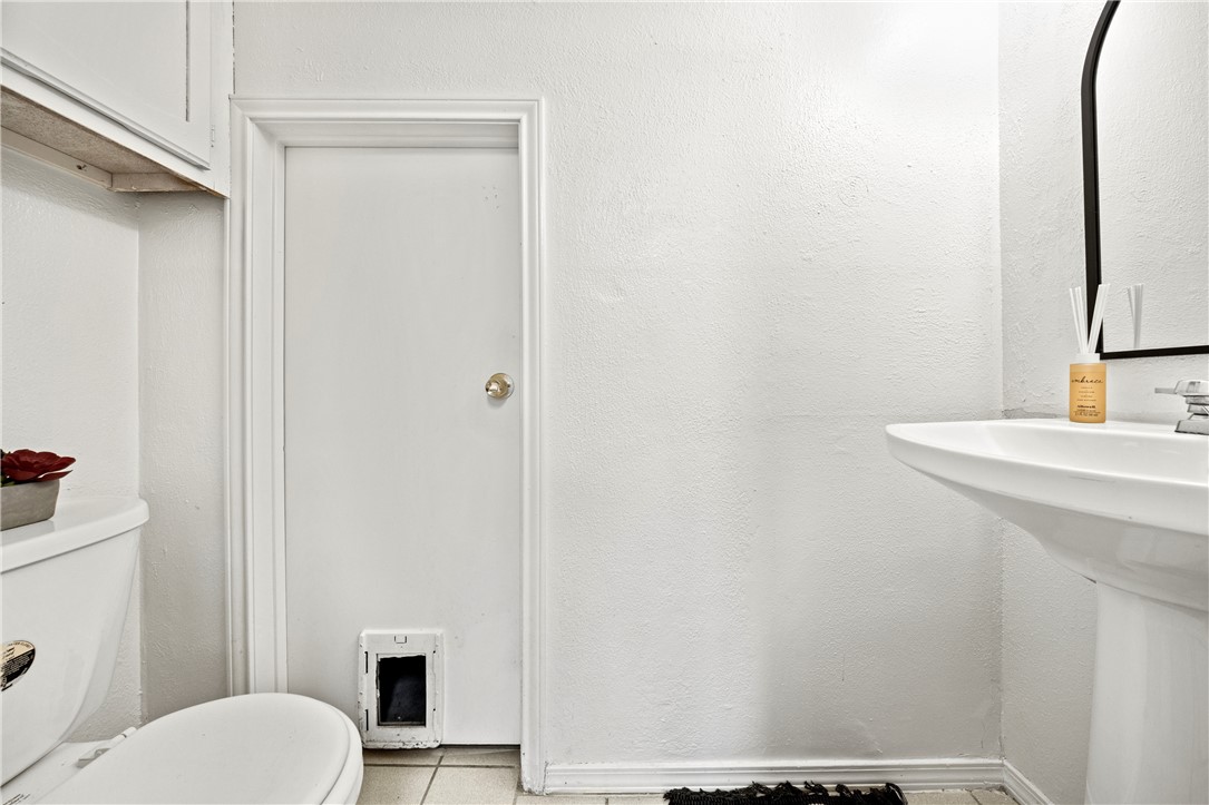 6702 Everhart Road, Unit H104 Corpus Christi, TX 78413 - Photo 9 of 20 Half bathroom downstairs