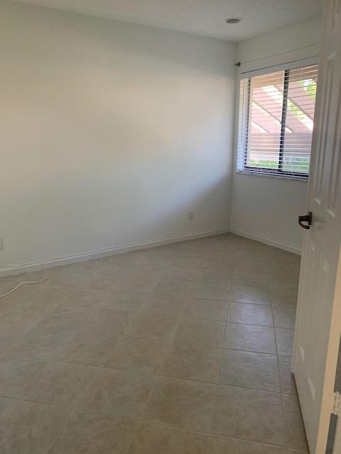 5740 Coach House Circle, Unit B Boca Raton, FL 33486 - Photo 11 of 13 Bedroom 2
