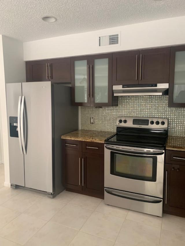 5740 Coach House Circle, Unit B Boca Raton, FL 33486 - Photo 4 of 13 Kitchen 1