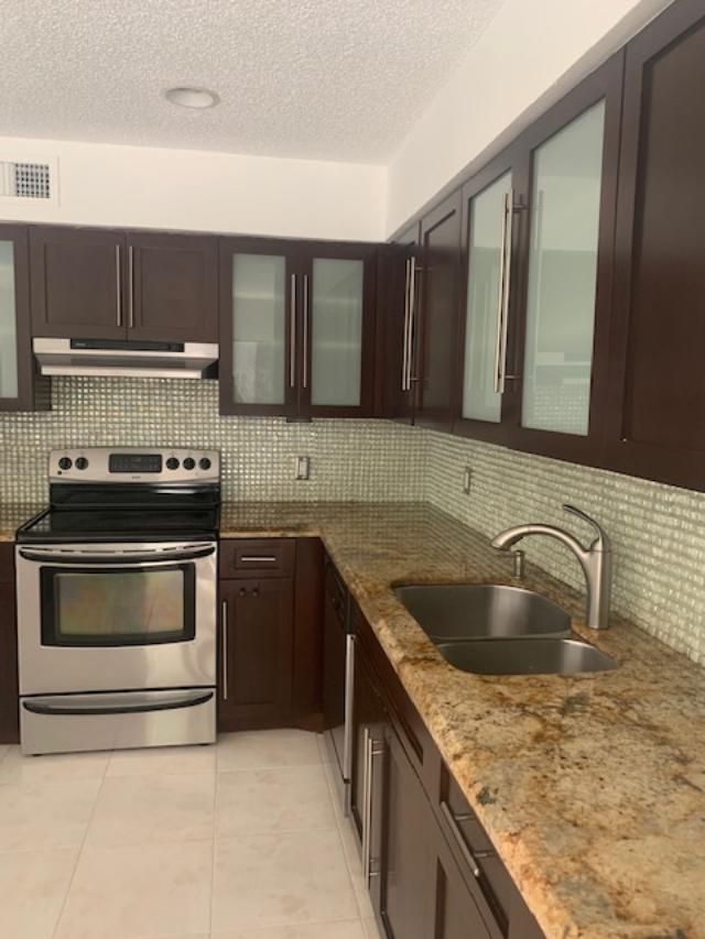 5740 Coach House Circle, Unit B Boca Raton, FL 33486 - Photo 5 of 13 Kitchen 2