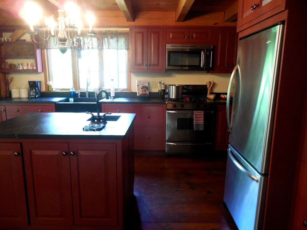 2860 Greenwich Road Hardwick, MA 01082 - Photo 11 of 28 a kitchen with stainless steel appliances wooden cabinets and a counter top space