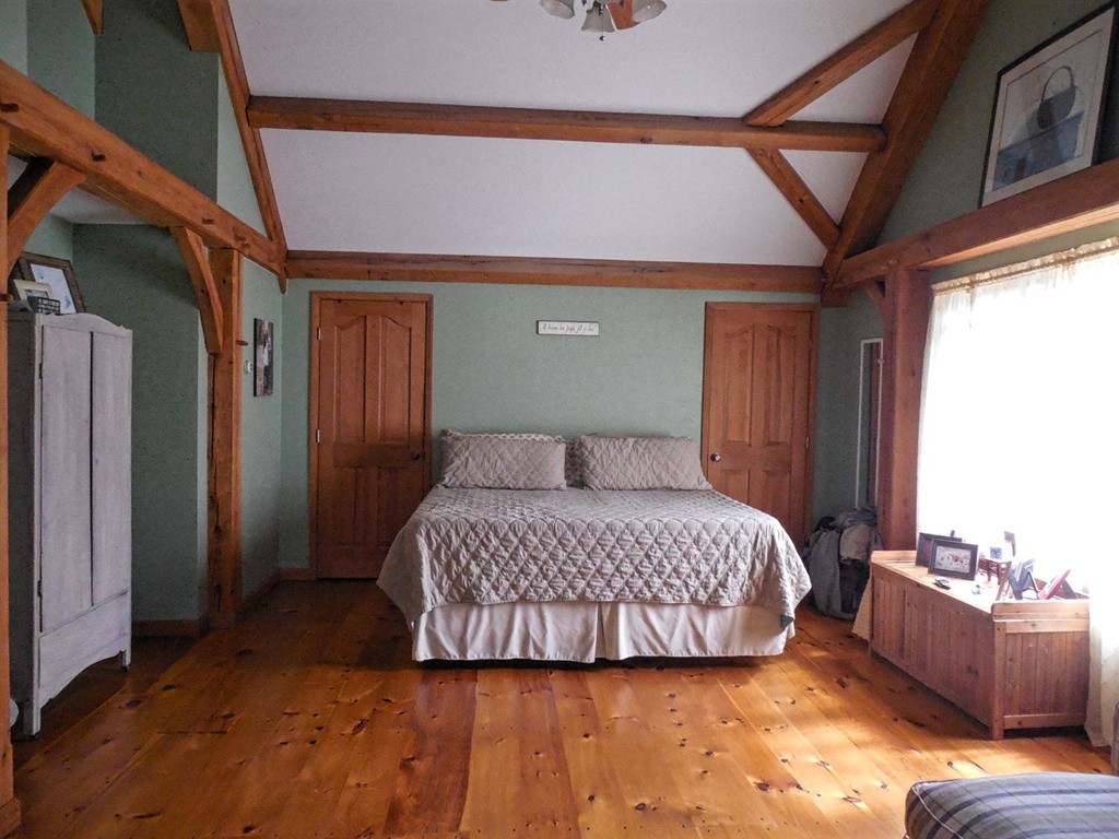 2860 Greenwich Road Hardwick, MA 01082 - Photo 20 of 28 a bedroom with a bed and a window