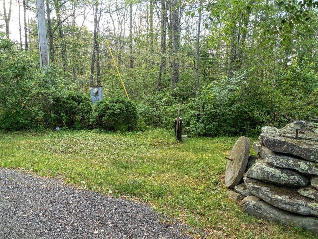 2860 Greenwich Road Hardwick, MA 01082 - Photo 8 of 28 a backyard of a house with lots of green space