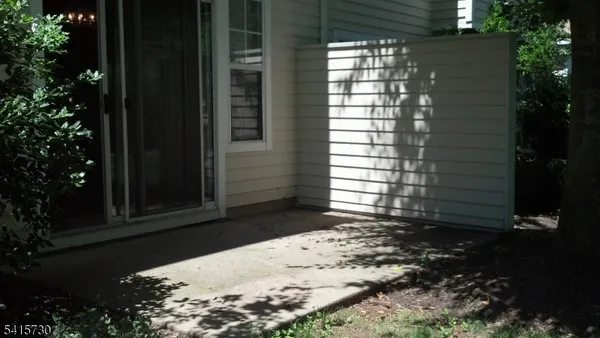 a view of a backyard of the house