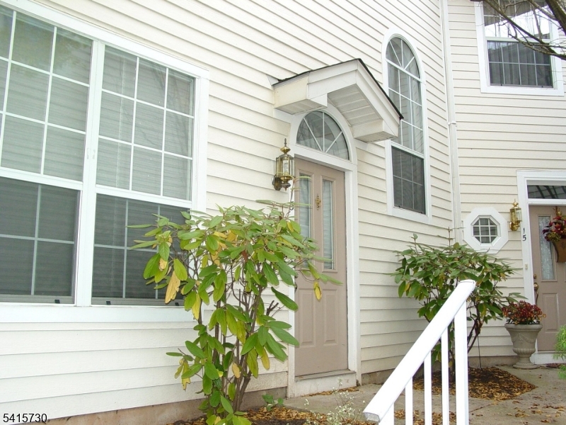 13 Wood Duck Pond Road Bedminster, NJ 07921 - Photo 2 of 13 a view of a house with a potted plant