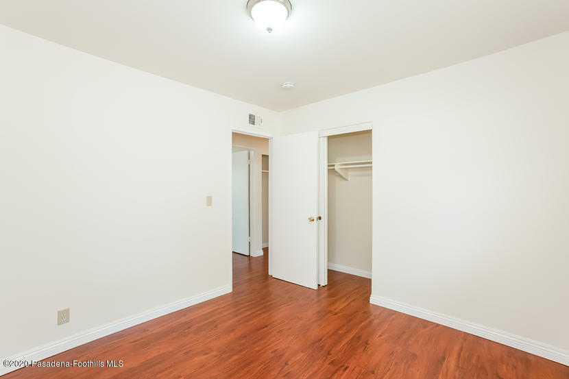 23537 Decorah Road Diamond Bar, CA 91765 - Photo 22 of 25 a view of an empty room with wooden floor