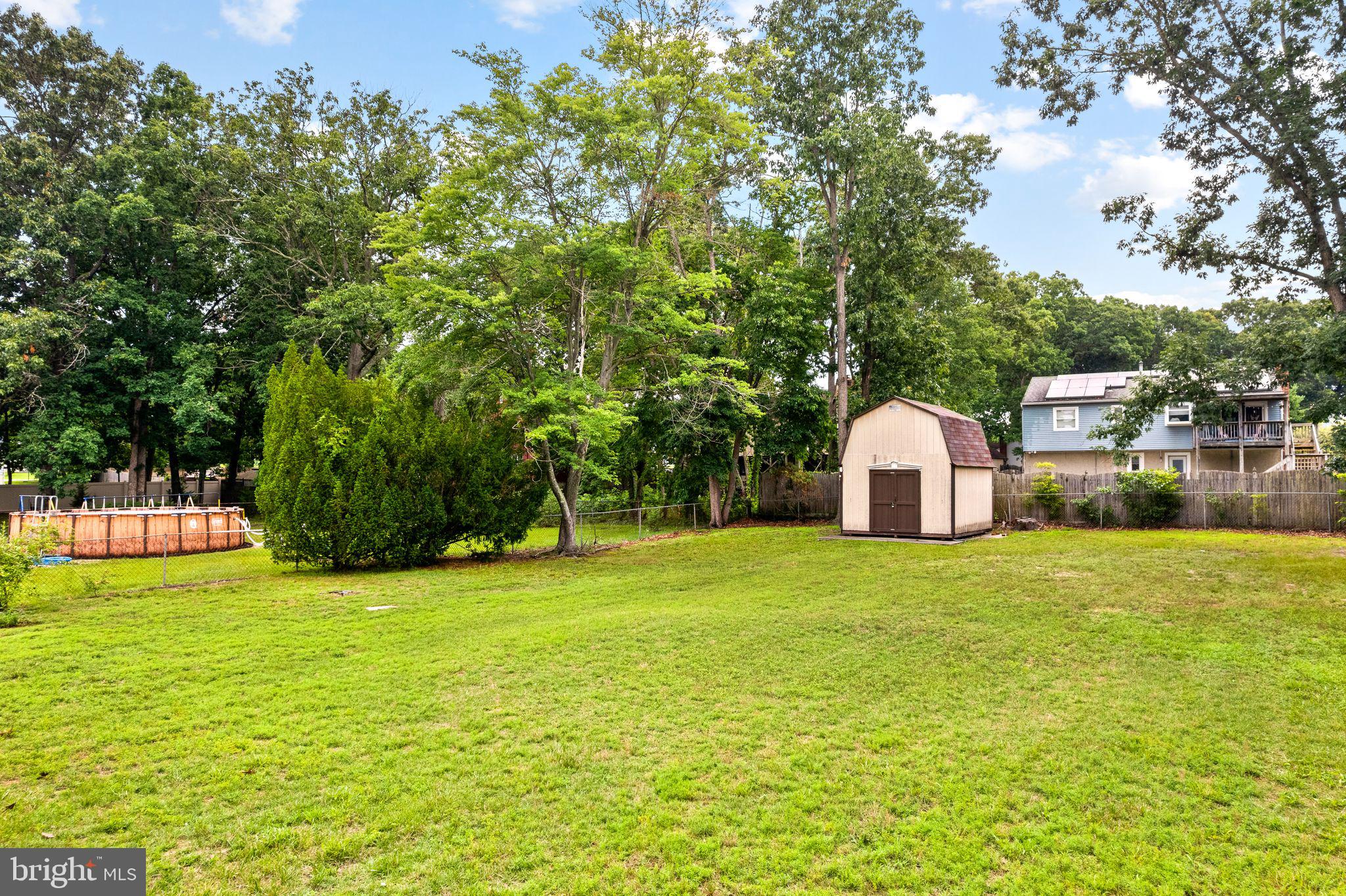 16 Prospect Avenue Sicklerville, NJ 08081 - Photo 28 of 34 Spacious yard with lush greenery.