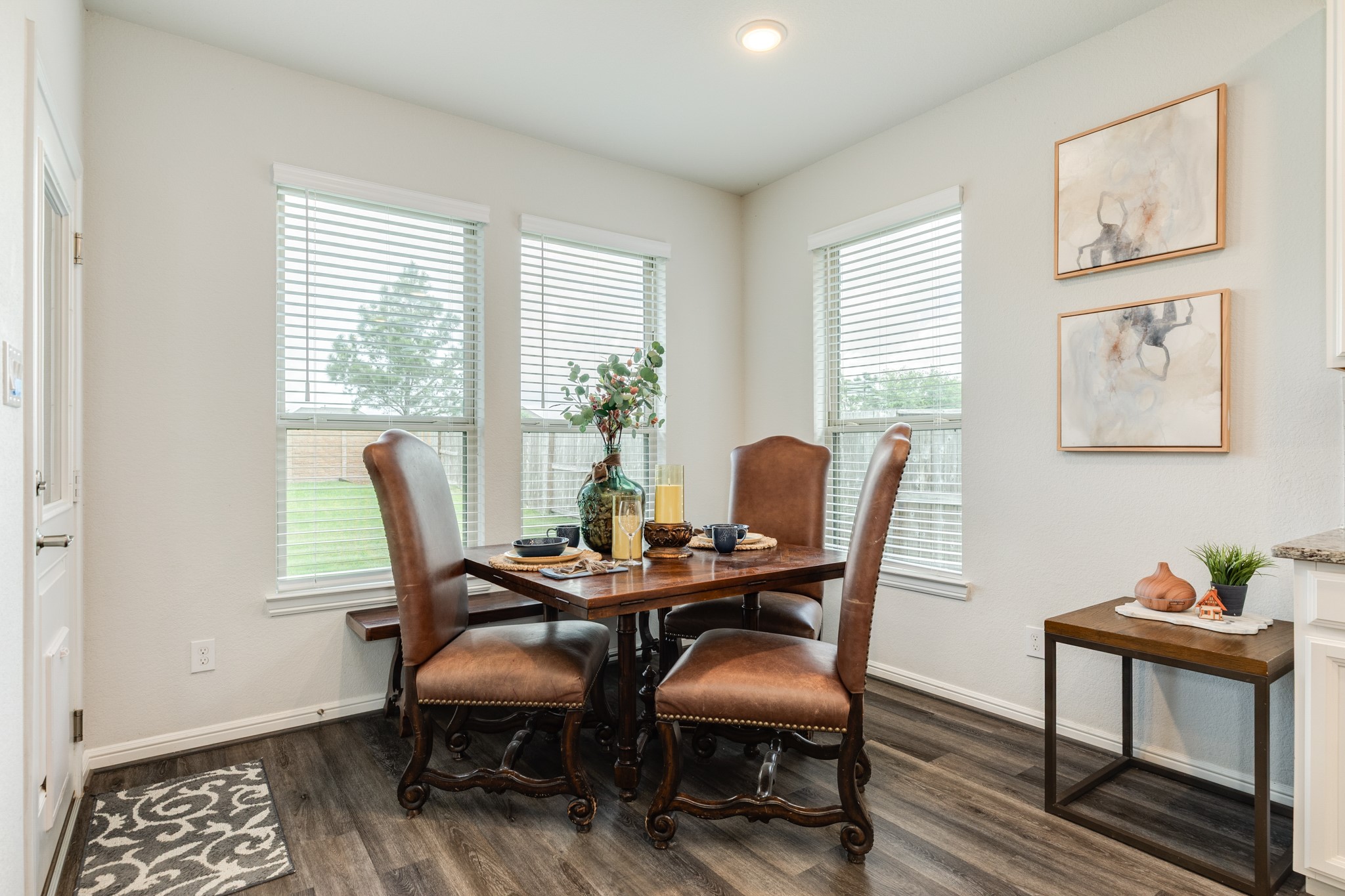 10306 Aldrin Drive Rosharon, TX 77583 - Photo 15 of 50 The breakfast nook offers views of the spacious back and side yards, with the added benefit of having no back neighbors.