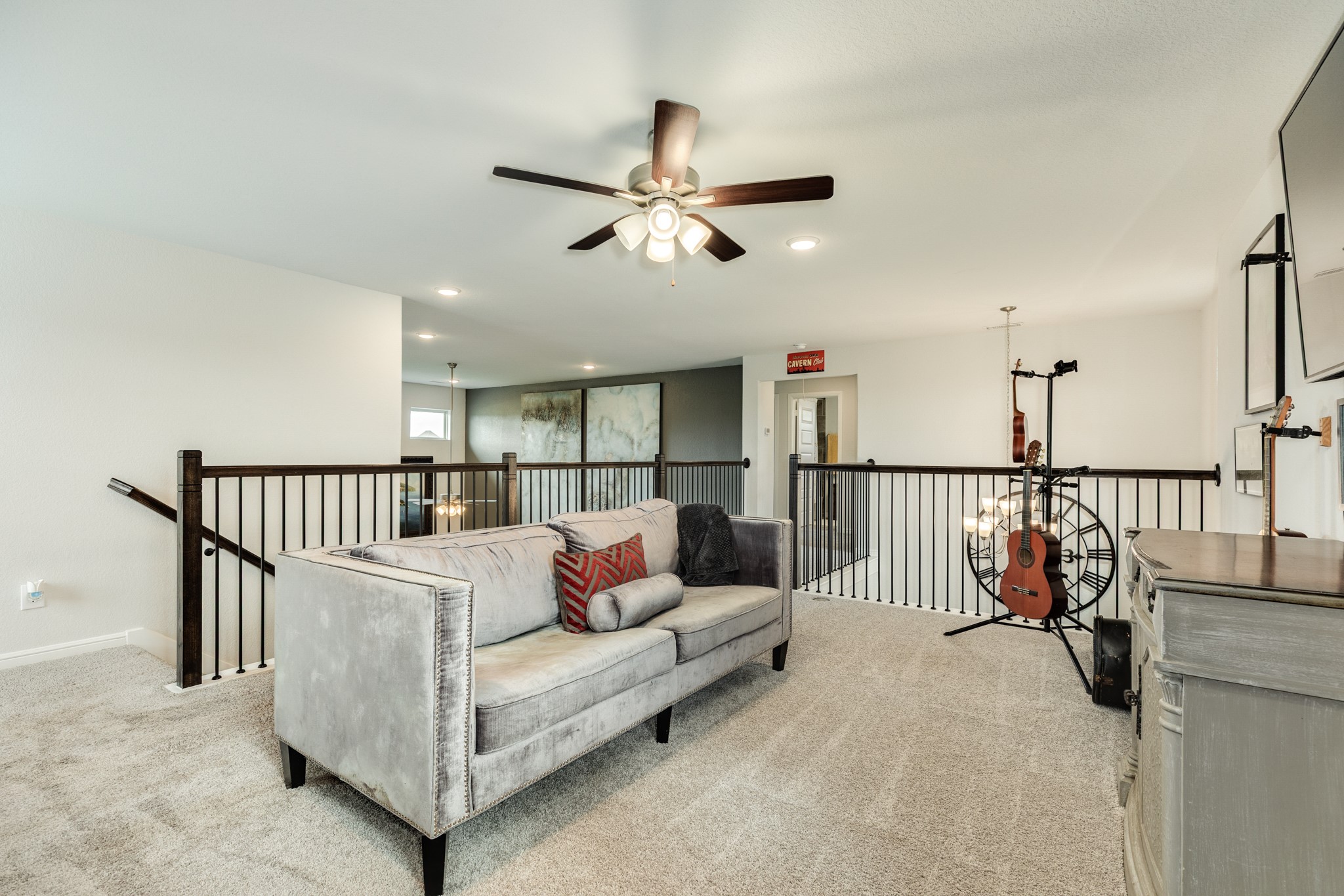 10306 Aldrin Drive Rosharon, TX 77583 - Photo 22 of 50 the game room upstairs is open very spacious can over look the family room and main entrance