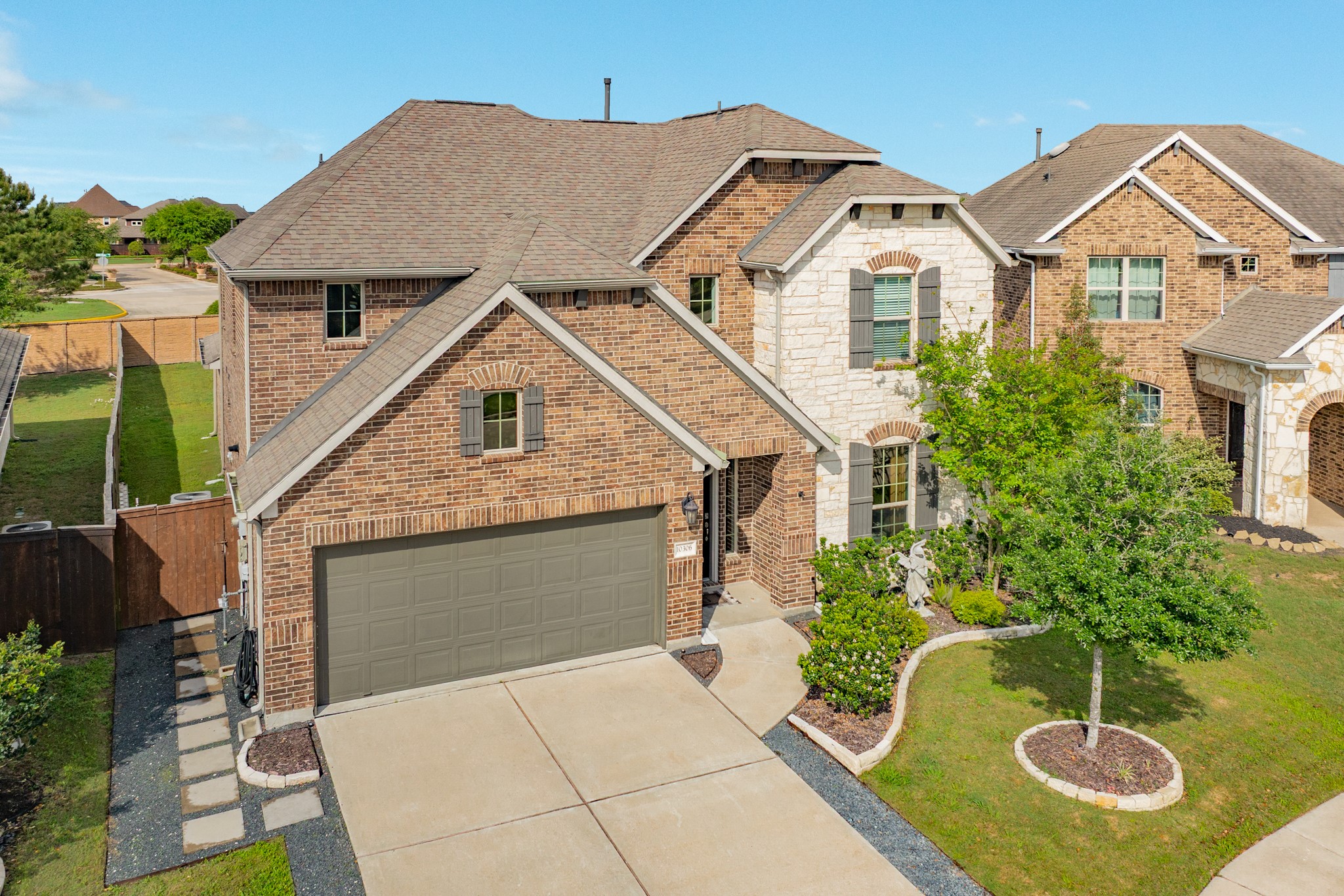 10306 Aldrin Drive Rosharon, TX 77583 - Photo 31 of 50 Aerial view of this beautiful brick and stone home, complete with great landscaping and a fenced backyard, is just waiting for a new owner.