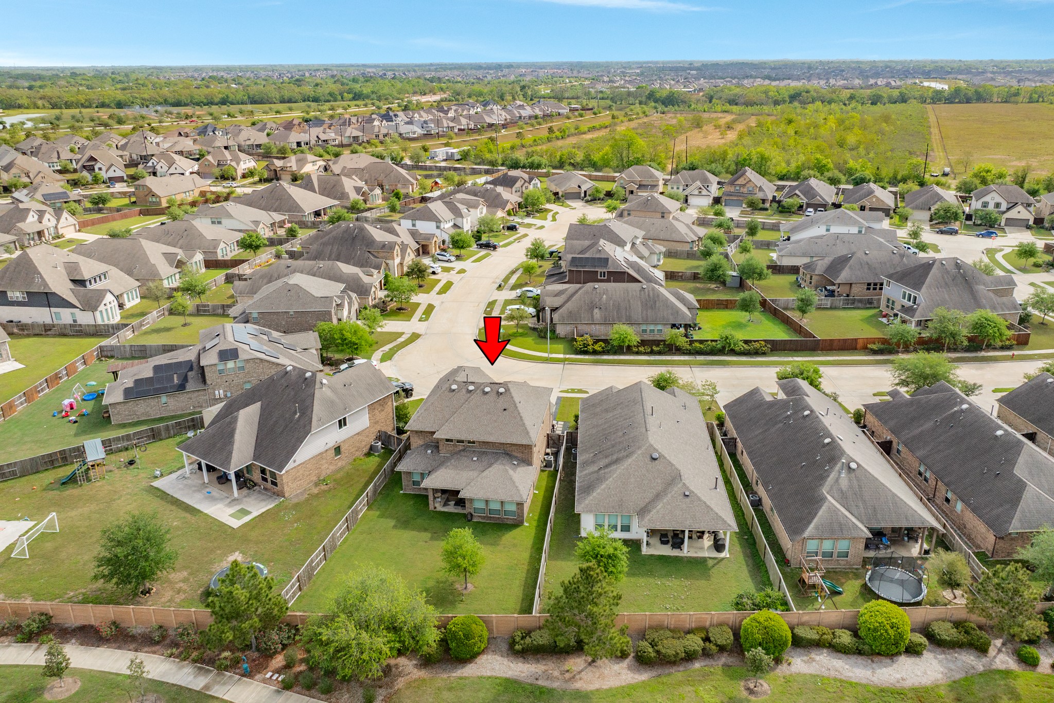 10306 Aldrin Drive Rosharon, TX 77583 - Photo 39 of 50 This aerial view depicts the roof and backyard, situated on a cul-de-sac.