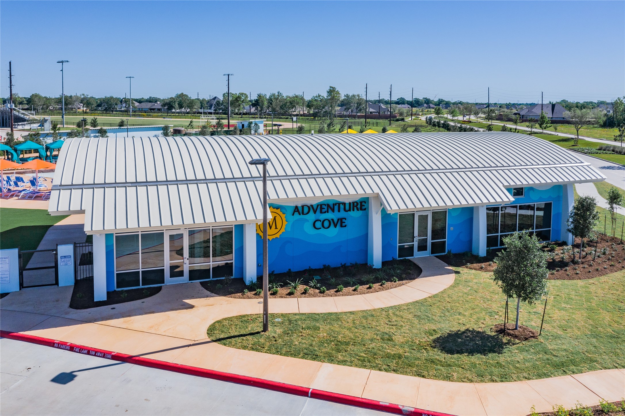 10306 Aldrin Drive Rosharon, TX 77583 - Photo 41 of 50 Adventure Cove features an updated, modern gym and is home to the lazy river, wave pool, and family pool.