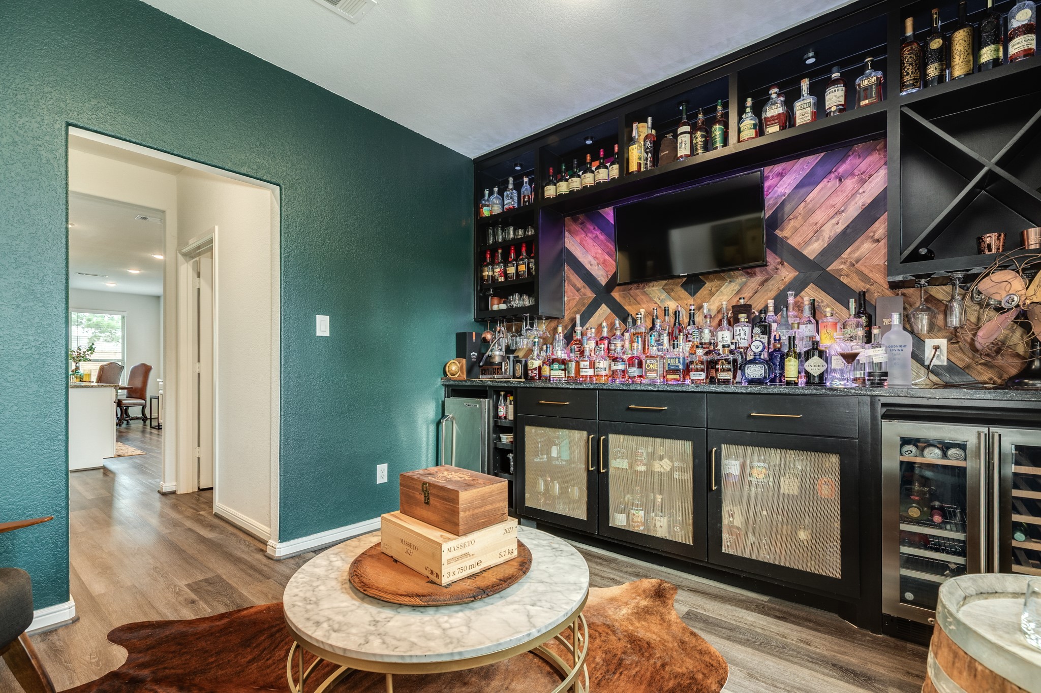 10306 Aldrin Drive Rosharon, TX 77583 - Photo 7 of 50 This view highlights the seamless transition into the kitchen, making it an excellent space for entertaining.