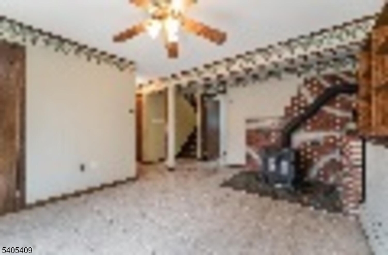 217 Van Syckles Road Hampton, NJ 08827 - Photo 12 of 16 a view of a hallway with a large tree