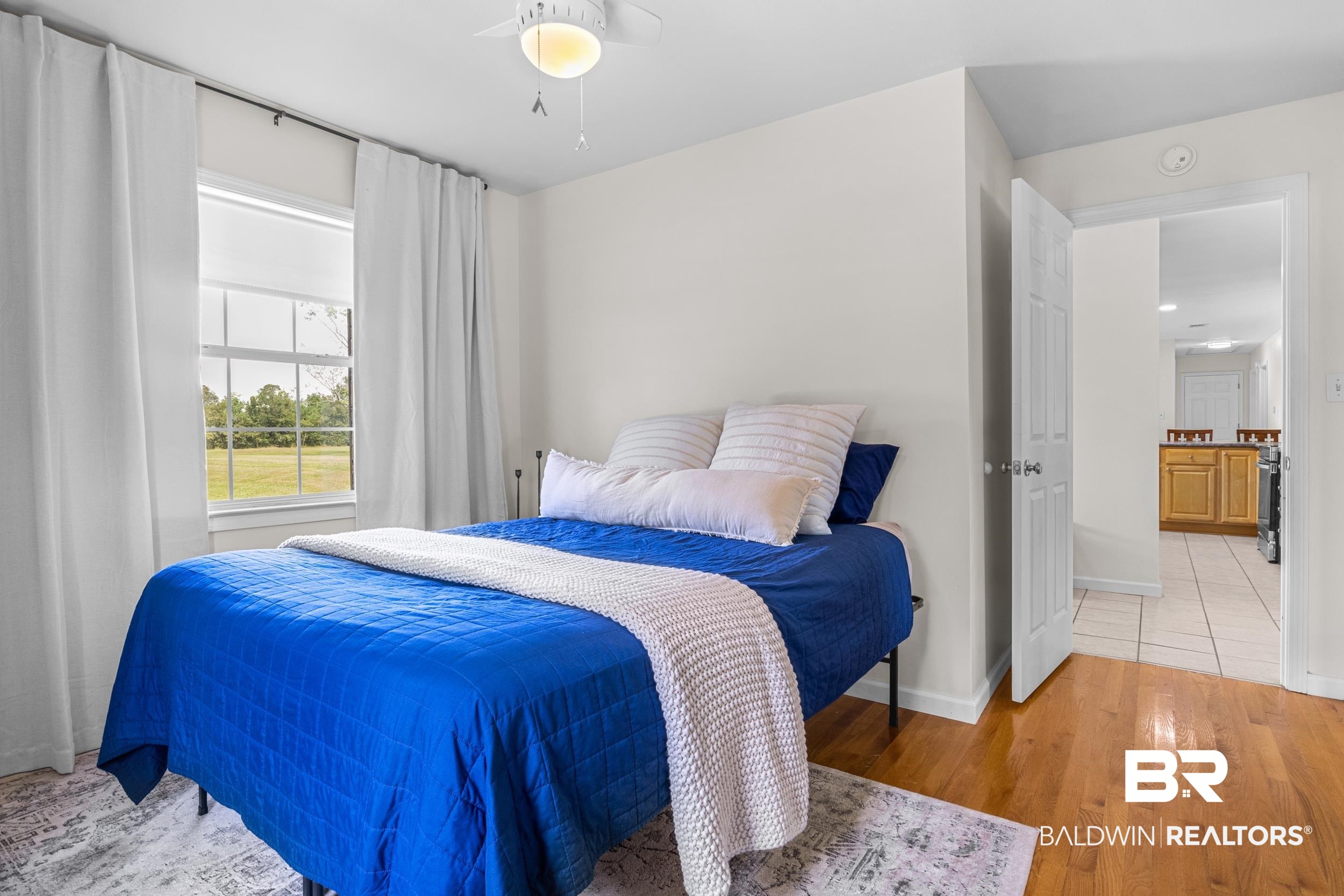 17689 Brewer Road Foley, AL 36535 - Photo 20 of 54 Bedroom featuring ceiling fan and hardwood / wood-style floors