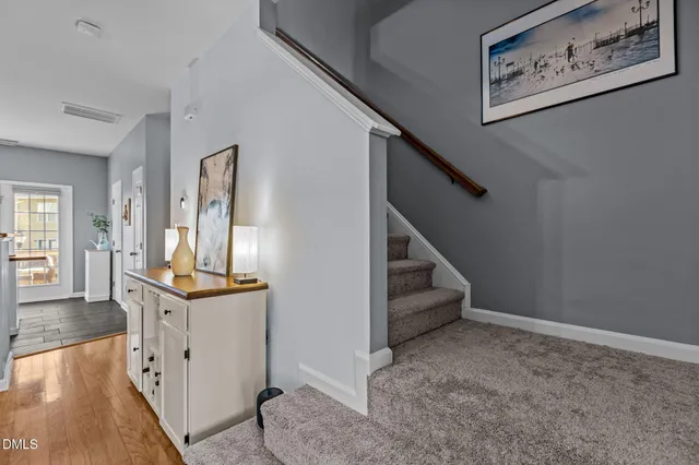 a kitchen with a sink stove and refrigerator
