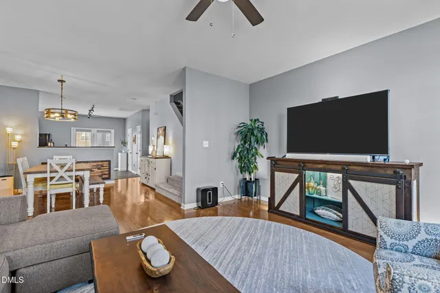 a view of an entryway with wooden floor