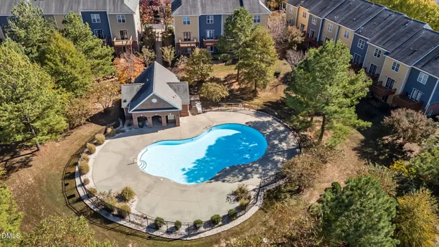 a view of a chairs and table in the patio