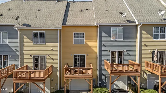 a view of a house with brick walls
