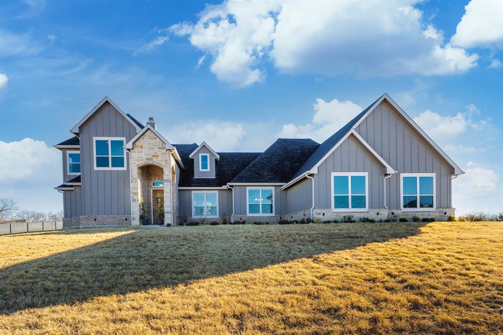 103 Silver Spur Road Boyd, TX 76023 - Photo 1 of 1 a front view of a house with a yard