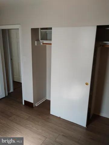 a view of room with window and gate