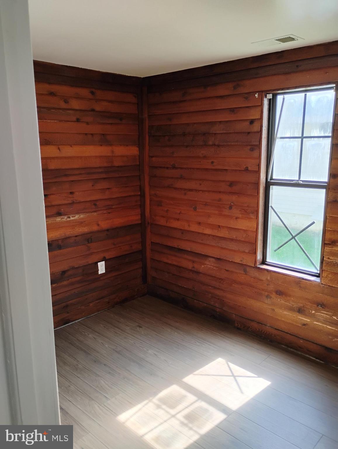 933 Andrews Road Glen Burnie, MD 21060 - Photo 14 of 22 a view of room with window and gate