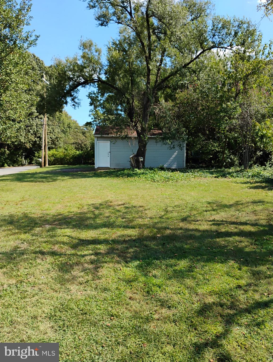 933 Andrews Road Glen Burnie, MD 21060 - Photo 20 of 22 a view of a water with a building in the background