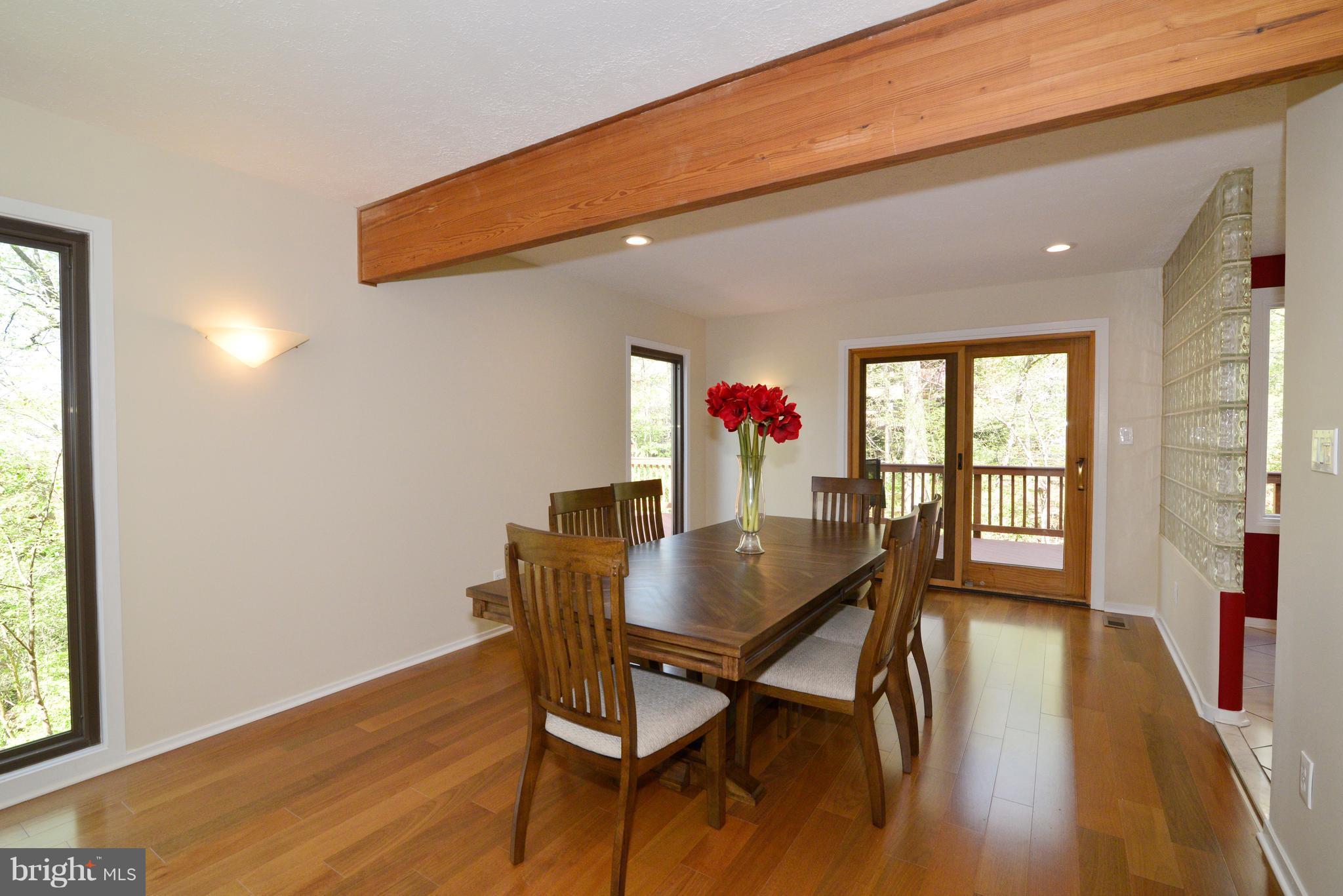 2203 Spinnaker Court Reston, VA 20191 - Photo 5 of 30 a view of a dining room with furniture and wooden floor