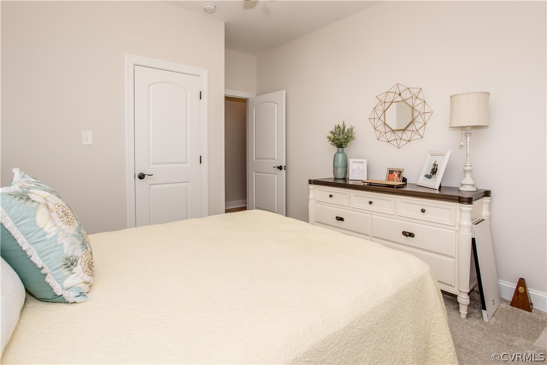 13790 Glebe Road Dewitt, VA 23840 - Photo 16 of 39 a bedroom with a bed and a dresser