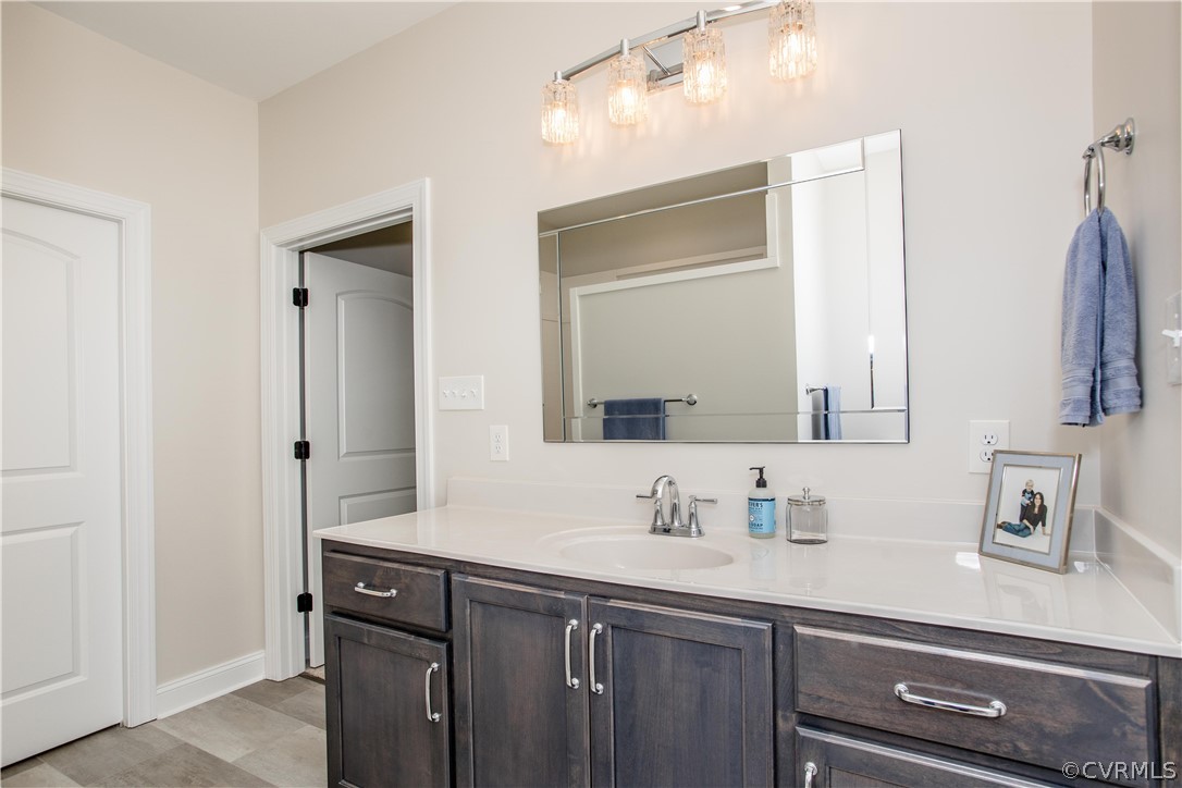13790 Glebe Road Dewitt, VA 23840 - Photo 22 of 39 a bathroom with a sink and a mirror