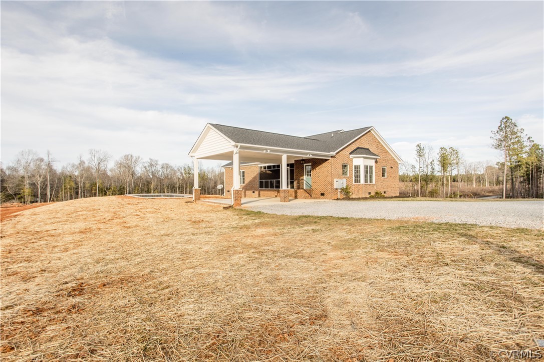 13790 Glebe Road Dewitt, VA 23840 - Photo 24 of 39 a front view of a house with a yard