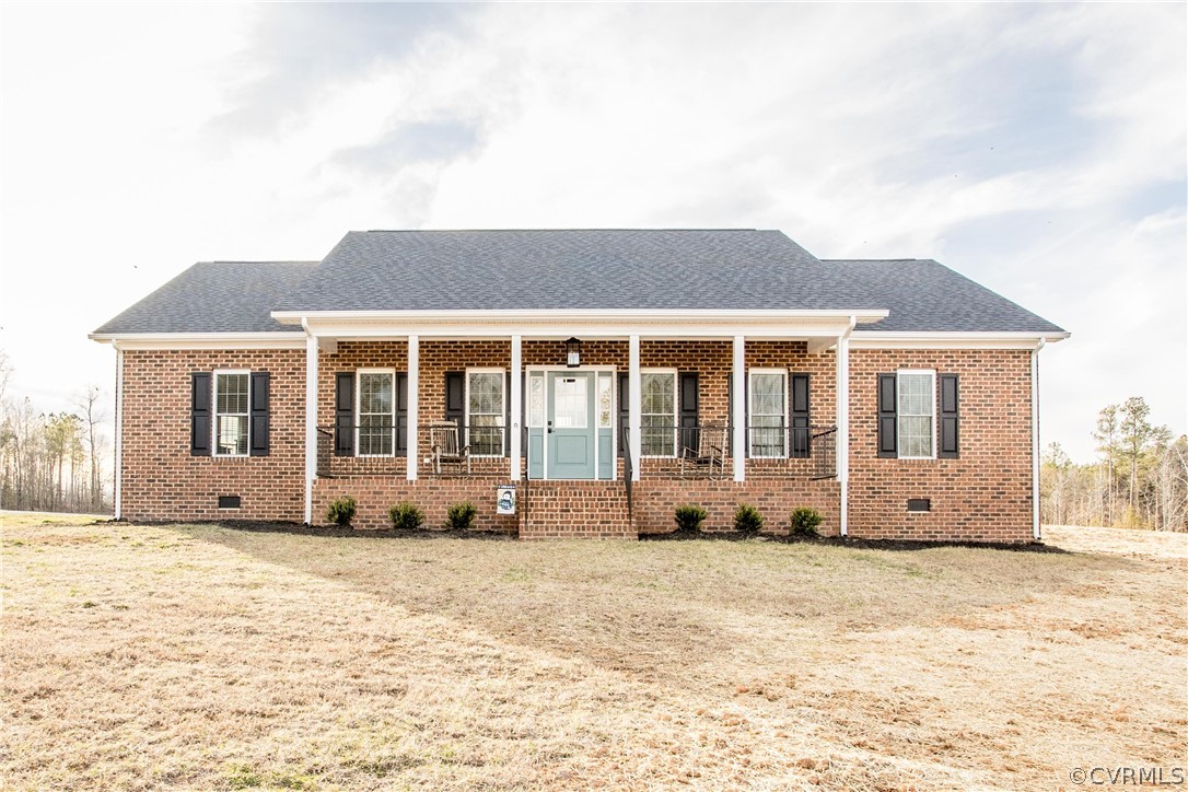 13790 Glebe Road Dewitt, VA 23840 - Photo 27 of 39 a front view of a house with a yard