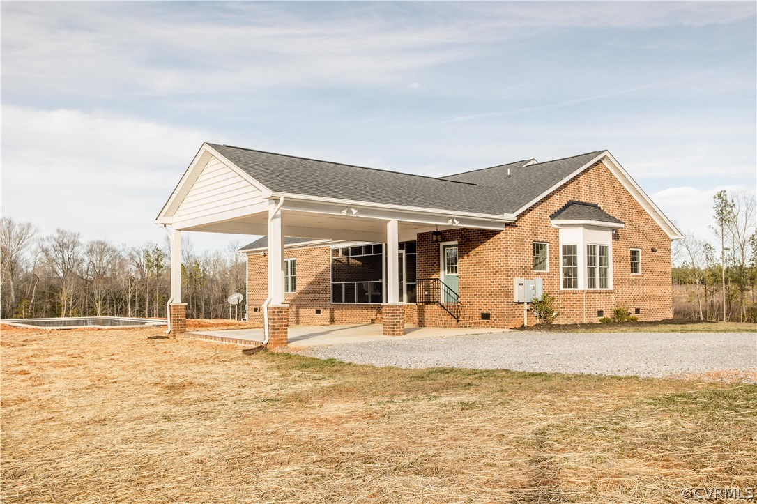 13790 Glebe Road Dewitt, VA 23840 - Photo 28 of 39 a view of a house with a yard outdoor seating