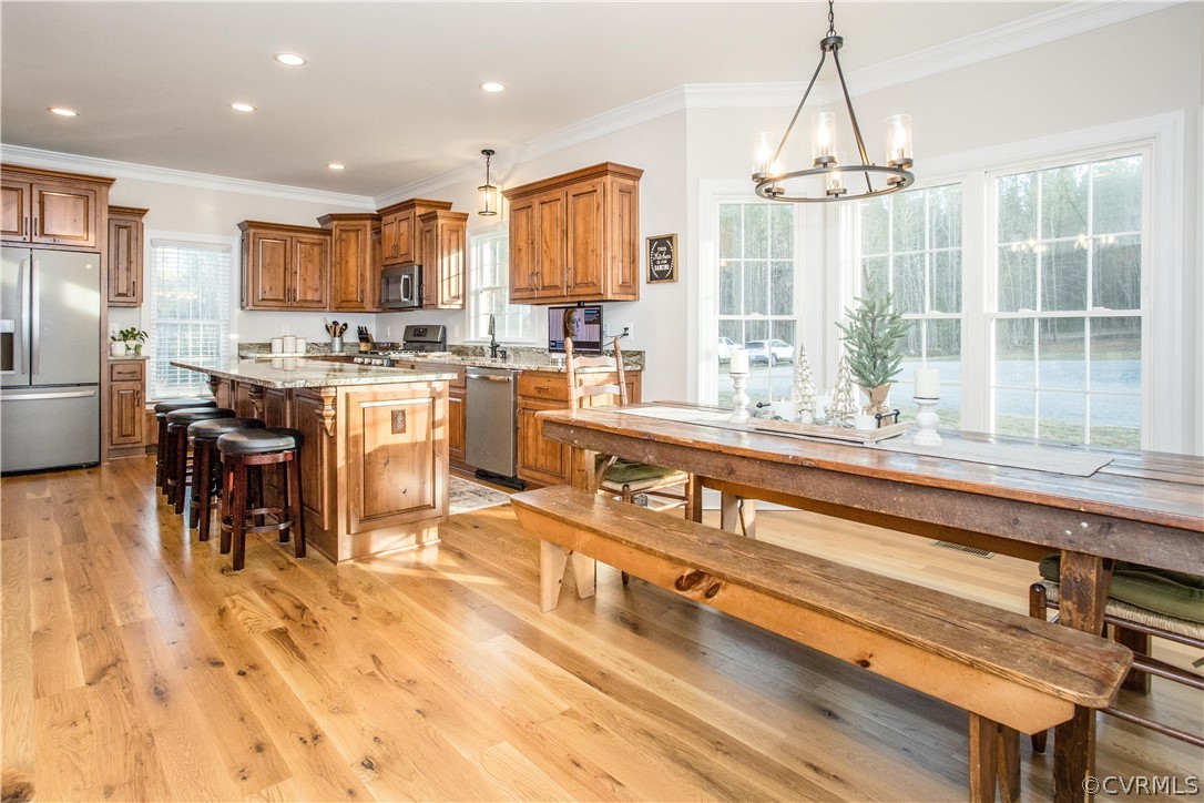13790 Glebe Road Dewitt, VA 23840 - Photo 3 of 39 a large kitchen with kitchen island a large window and cabinets