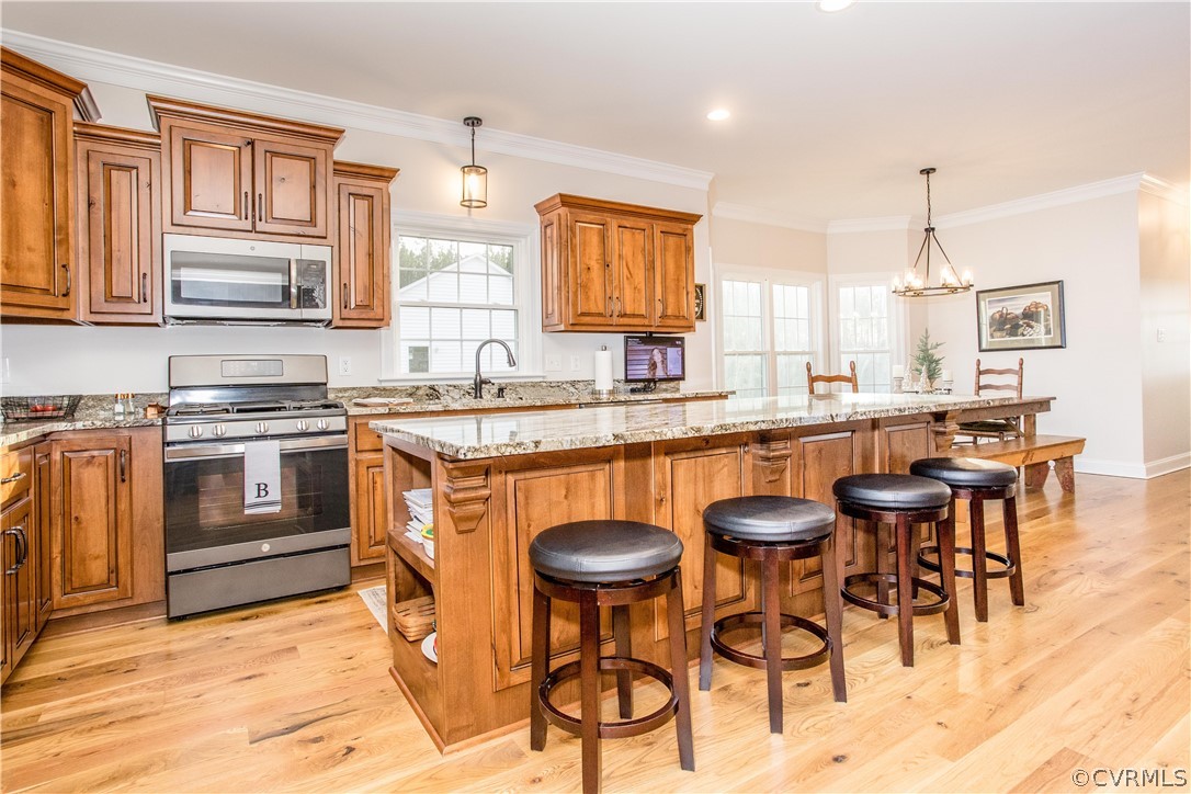 13790 Glebe Road Dewitt, VA 23840 - Photo 6 of 39 a kitchen with stainless steel appliances granite countertop a stove a sink and a refrigerator