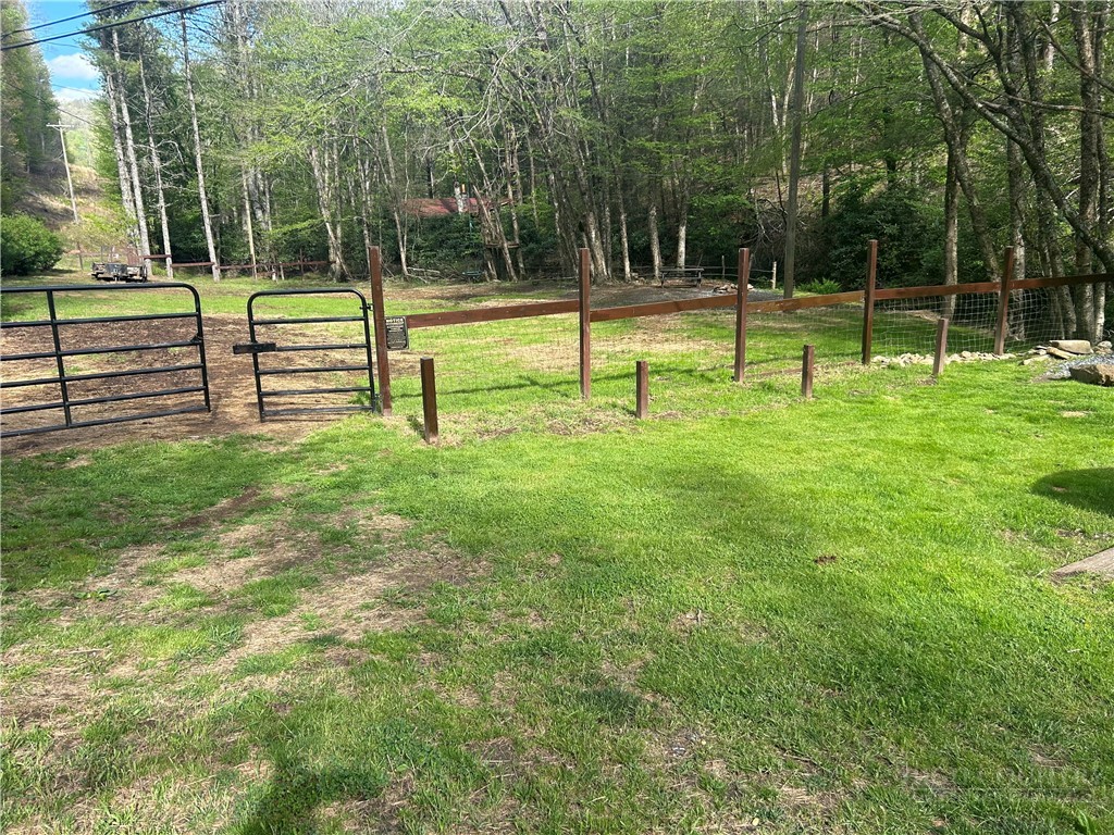 2291 Pine Swamp Road Fleetwood, NC 28626 - Photo 15 of 37 a view of a park with a slide