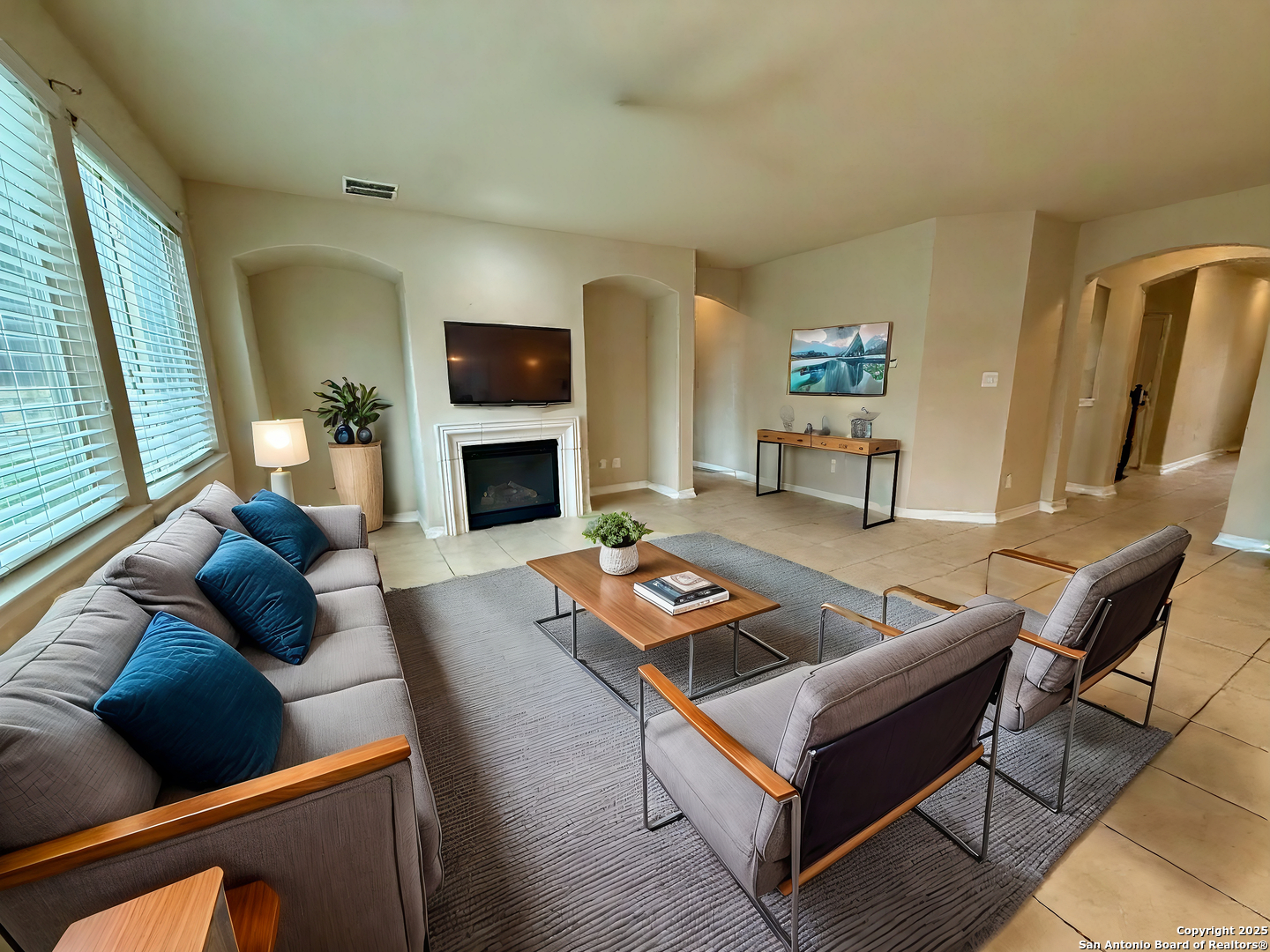 2930 Elm Tree Park San Antonio, TX 78259 - Photo 13 of 44 a living room with furniture and a fireplace