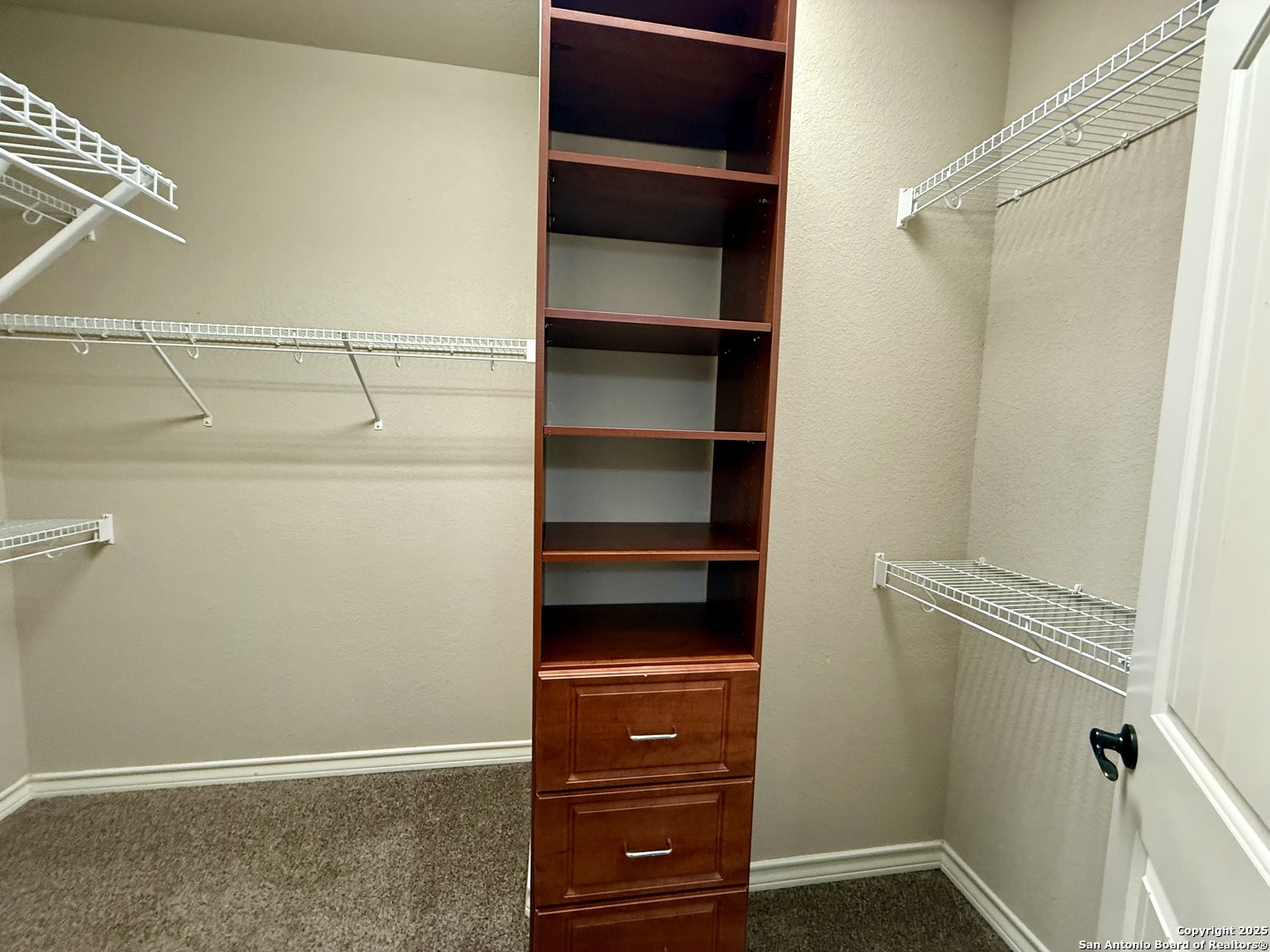 2930 Elm Tree Park San Antonio, TX 78259 - Photo 20 of 44 a view of walk in closet with empty racks