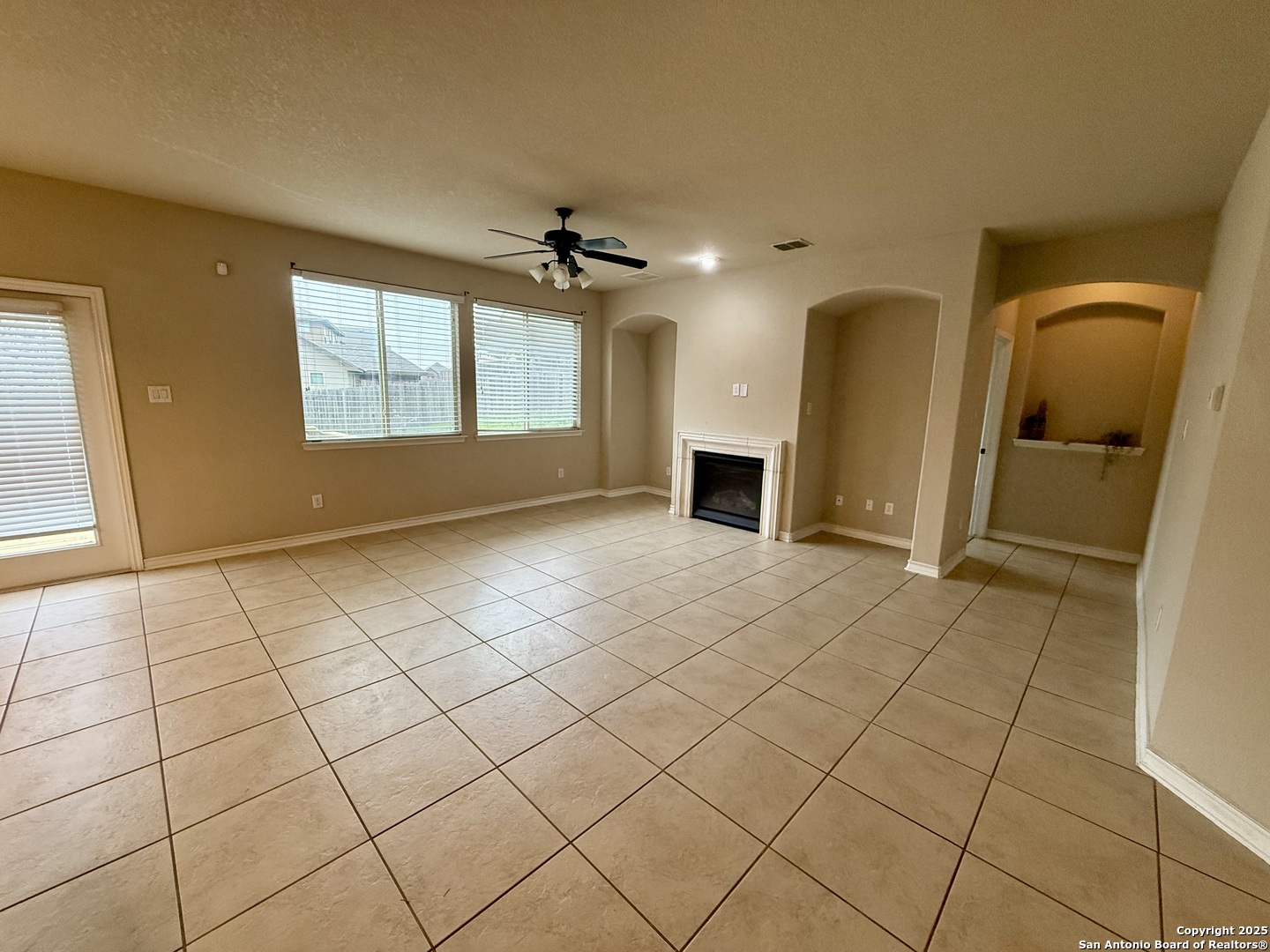 2930 Elm Tree Park San Antonio, TX 78259 - Photo 22 of 44 a view of empty room with window and fireplace